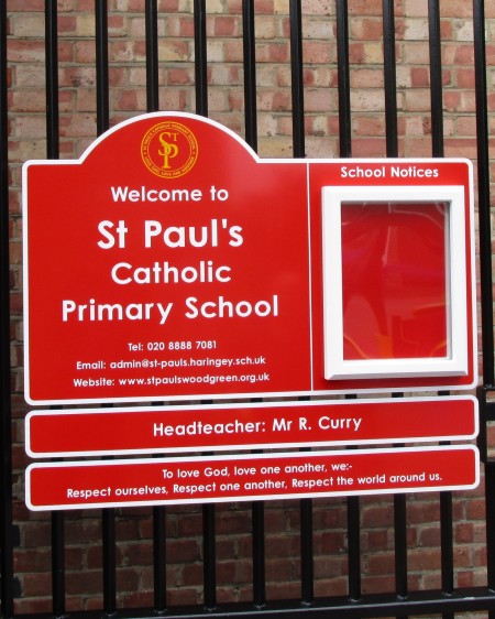 a school noticeboard on railings at St Pauls Catholic Primary School